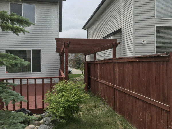Surveyor Pergola encroachment onto neighbor over fence